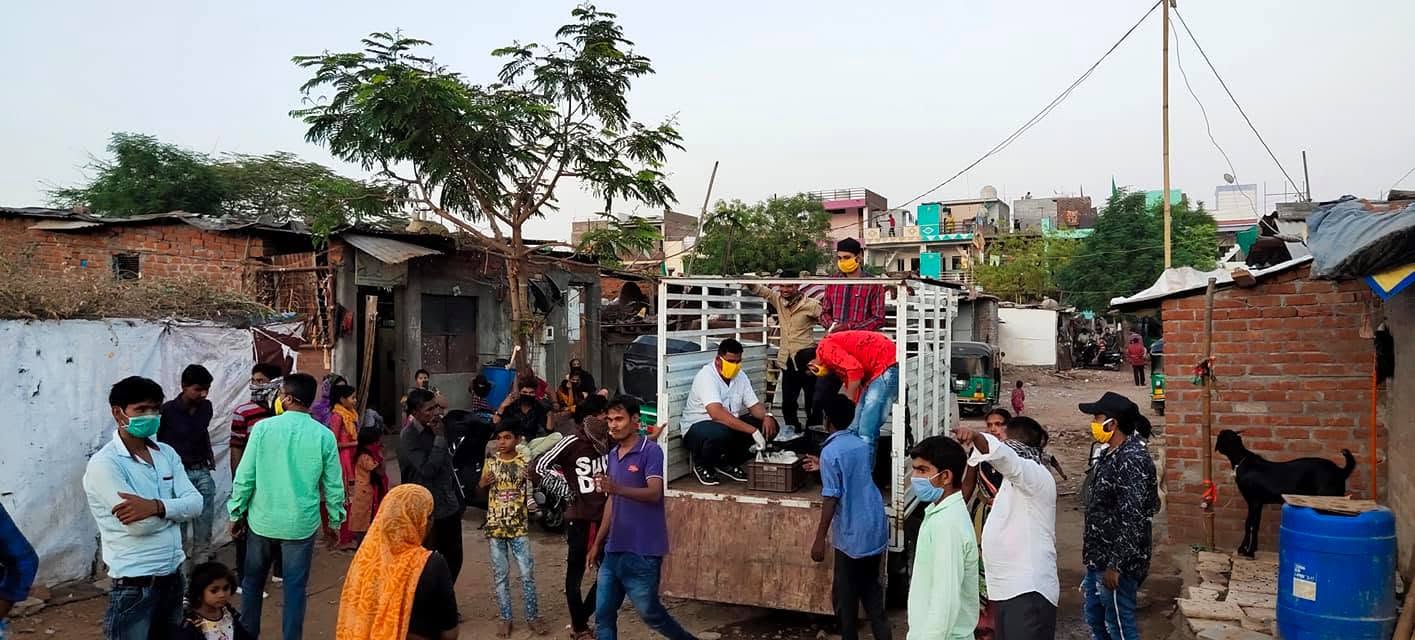 Sanjri Youth Foundation volunteers distributing relief supplies in Gorwa